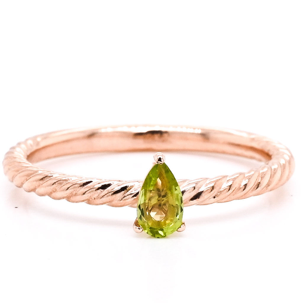 10KT Rose Gold Pear Shape Peridot Ring.

Peridot: 5x3mm
Band Width: