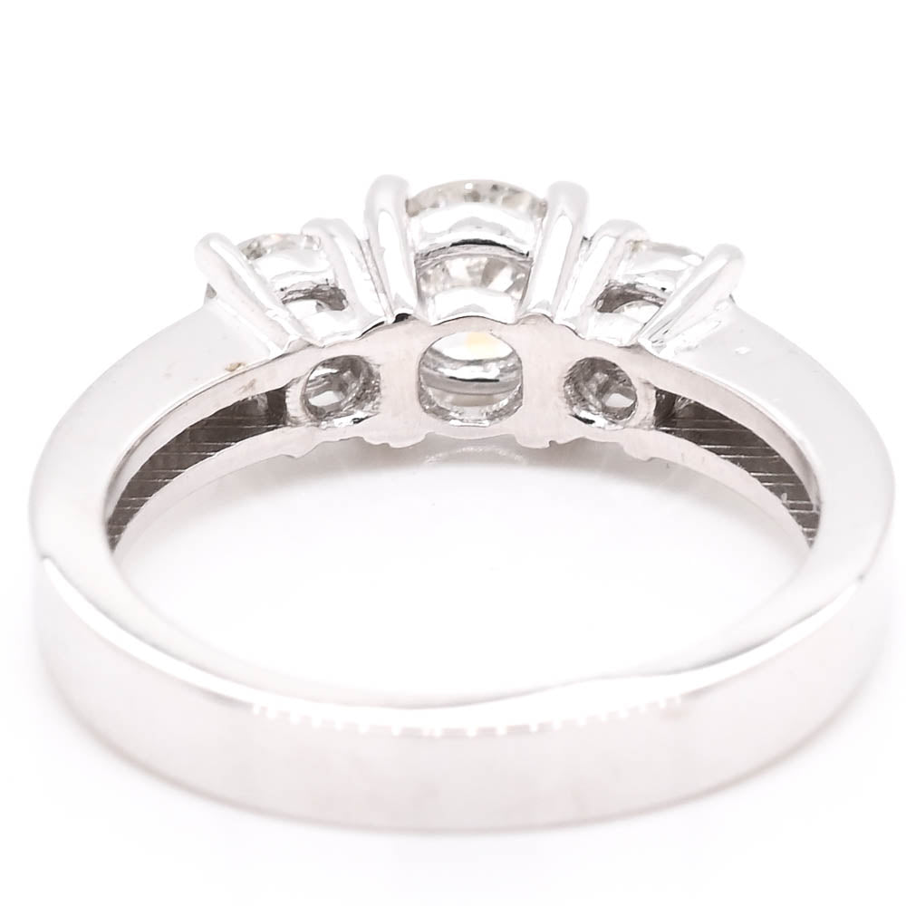 14KT White Gold 0.93CTW Round Brilliant Diamond Trinity Engagement Ring.