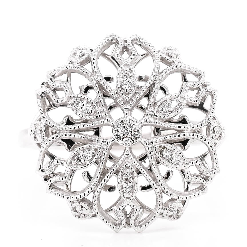 10KT White Gold 0.06CTW Diamond Flower Celebration Ring. 

Band Widt