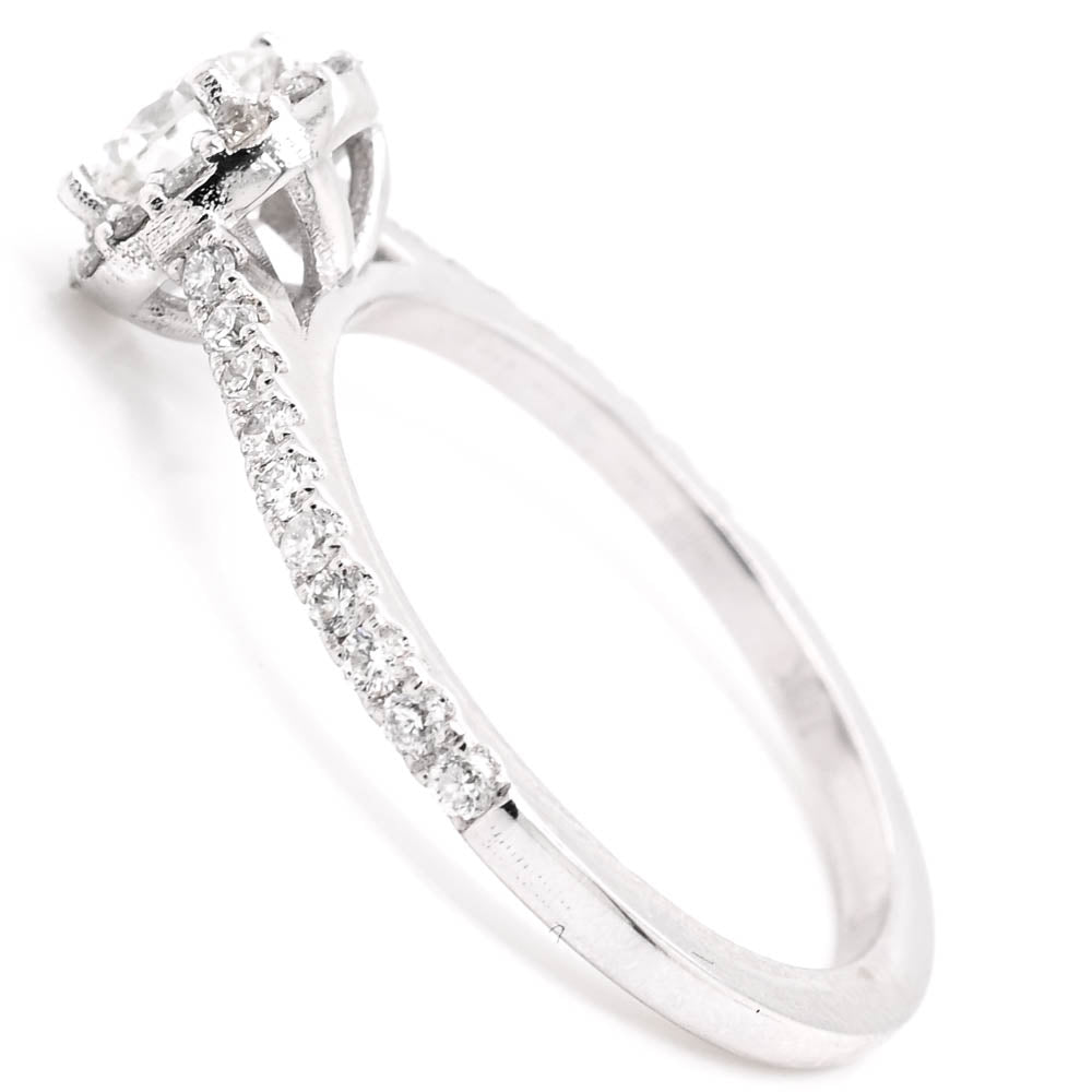14KT White Gold 0.78CTW Round Brilliant Halo Set Diamond Engagement Ring.