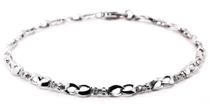 Graziella Originlas 10KT White Gold 7.5" 0.14CTW SI G-H Colour Diamond Infinity Bracelet.