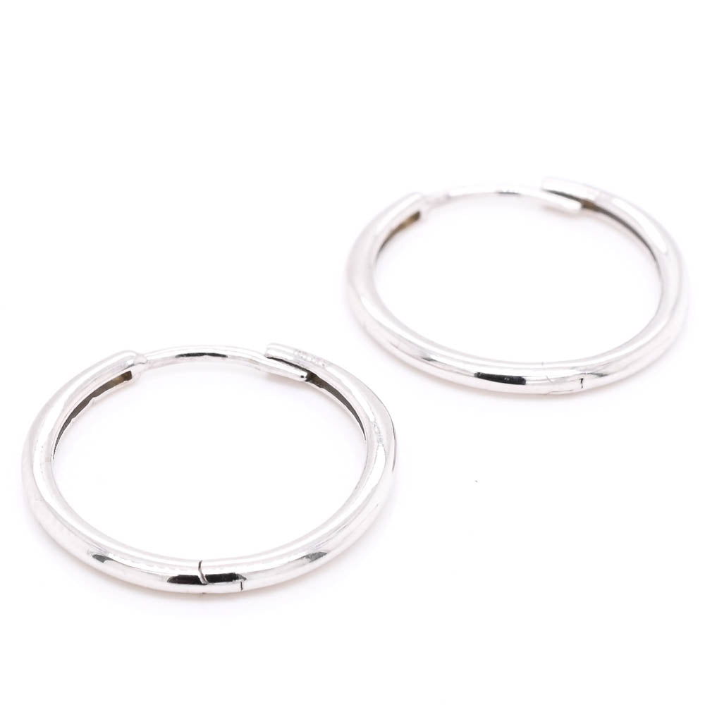 10KT White Gold 18mm Huggie Earrings.